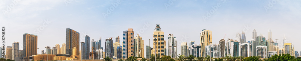 Panorama of Dubai Marina district skyline with many new high rise buildings, United Arab Emirates.