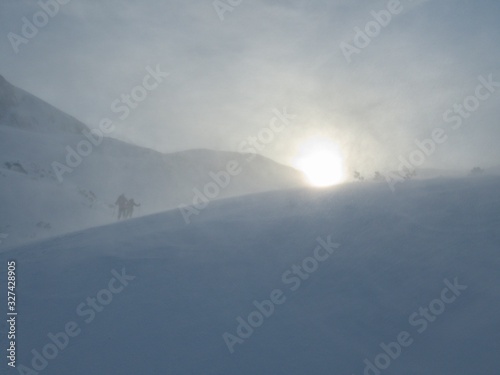 beautiful skitouring mountain terrain in winter landscape tennengebirge in austrian alps photo