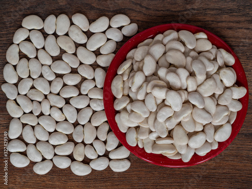 White Lima beans on wood photo