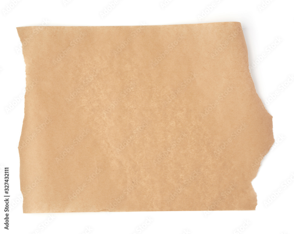 piece of brown parchment paper with torn edges isolated on a white background - obrazy, fototapety, plakaty 