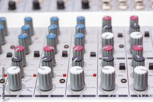 Audio sound mixer and amplifier equipment, sound acoustic musical mixing engineering concept background, selective focus.