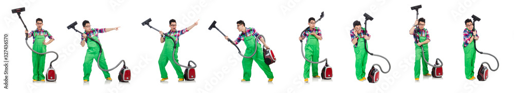 Funny man in green coveralls vacuum cleaning Funny man in green coveralls vacuum cleaning