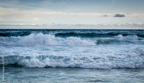 Waves crashing into shore