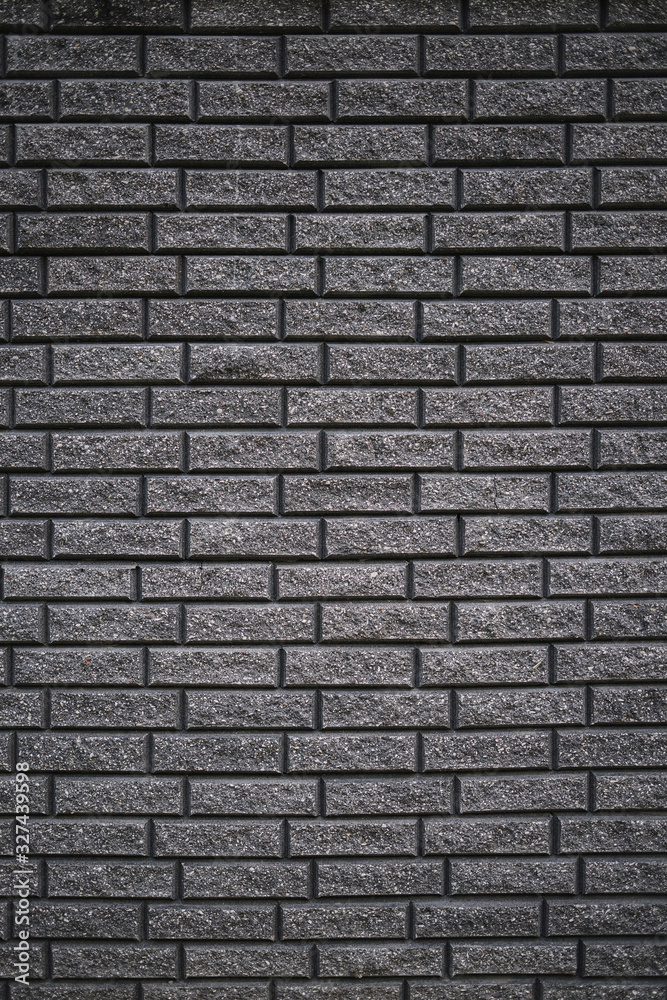 Wall of gray bricks. Pattern of grey brick wall for background and textured, Seamless grey brick wall background