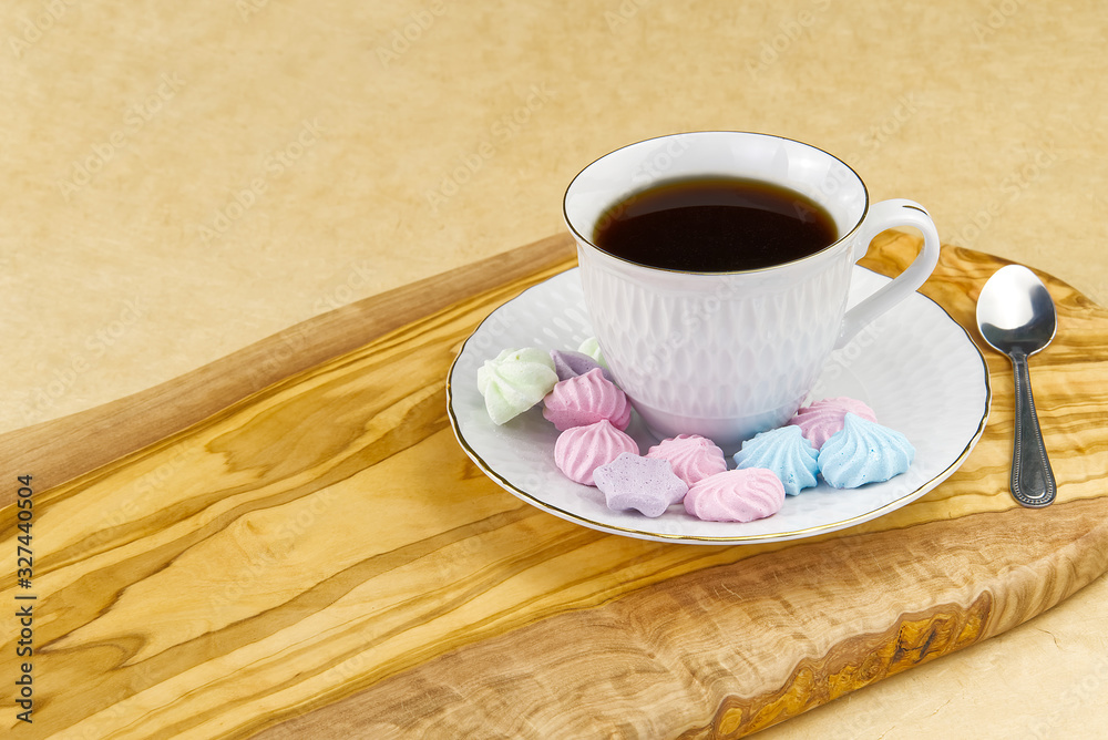 Obraz premium breakfast, coffee with bize cookies on olive wood board