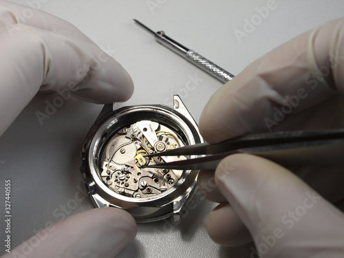 Εκτύπωση καμβά close up of watchmaker working on vintage chronograph mechanism