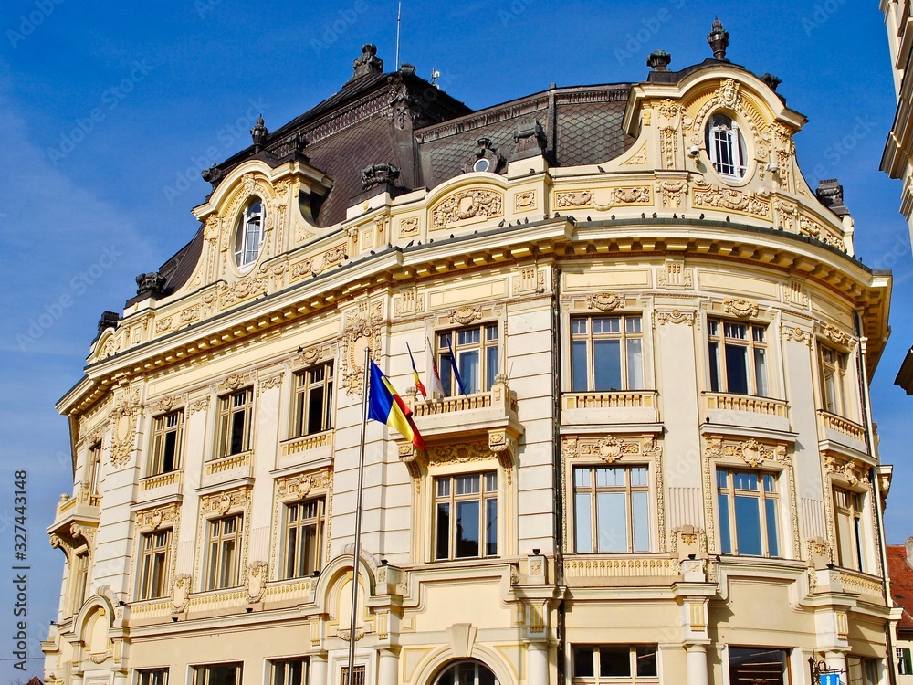 Obraz premium The city hall of Sibiu, Transylvania, Romania in the town square or city center called Piata Mare. 