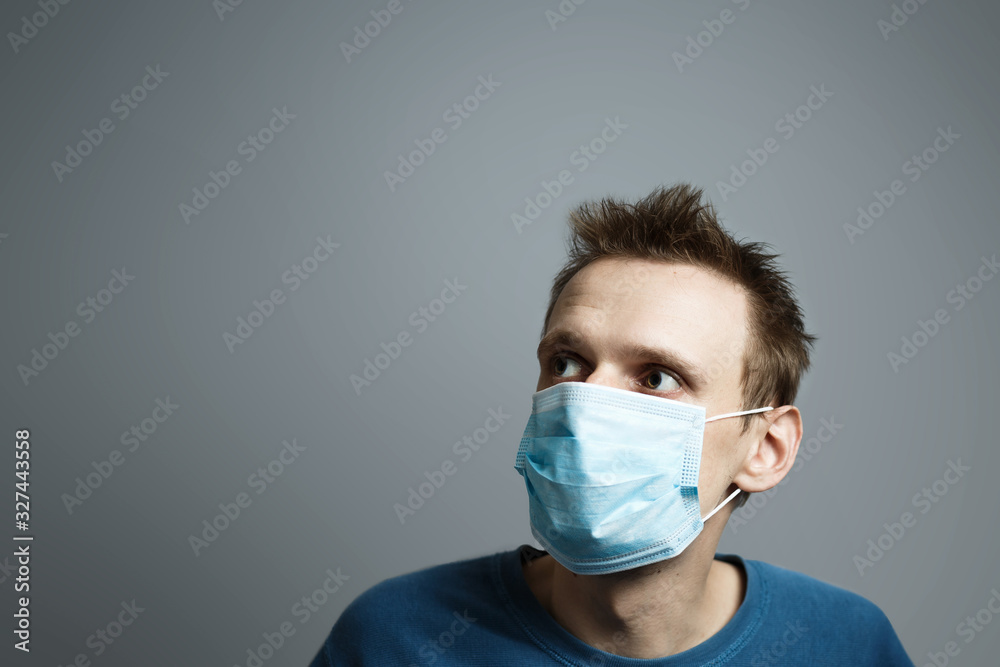 Young man in medical mask