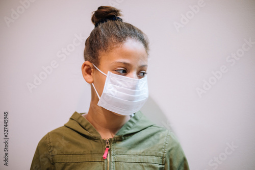 Teenager wearing a mask