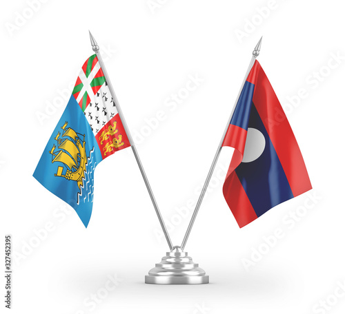 Laos and Saint Pierre and Miquelon table flags isolated on white 3D rendering photo