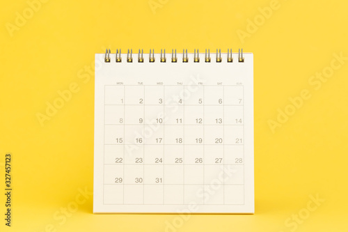 Clean desktop calendar with date 31 days on solid yellow background using as schedule planning, deadline to launch project or events and holiday reminder