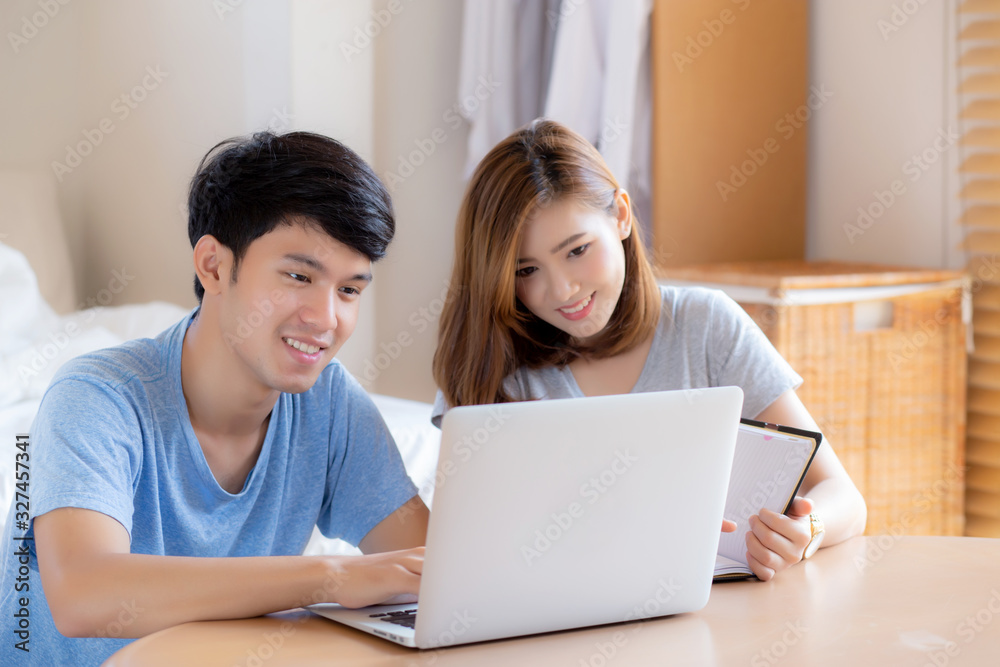 Beautiful young asian couple calculate expenses finance with laptop and planning together, woman writing notebook or note budget household, lifestyle family and business concept. Beautiful young asian couple calculate expenses finance with laptop and planning together, woman writing notebook or note budget household, lifestyle family and business concept.
