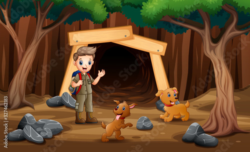 Scene with scout kids hiking in the mine with dogs