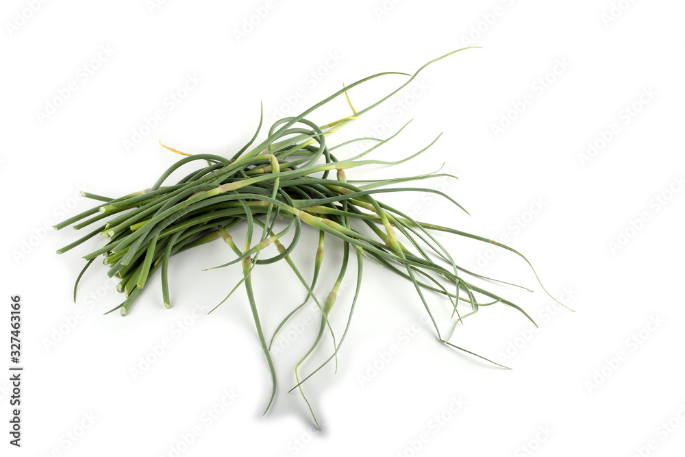 Obraz premium Czosnek strzały na białym tle