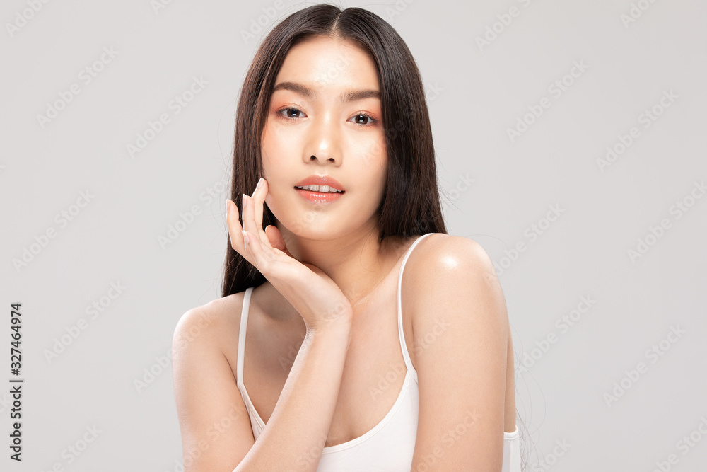 Beautiful Asian woman touching soft cheek smile with clean and fresh skin Happiness and cheerful with positive emotional,isolated on white background,Beauty and Cosmetics Concept Beautiful Asian woman touching soft cheek smile with clean and fresh skin Happiness and cheerful with positive emotional,isolated on white background,Beauty and Cosmetics Concept