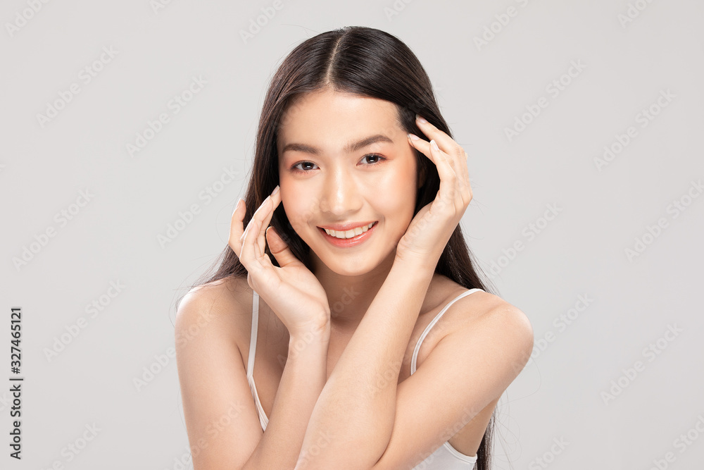 Beautiful Asian woman touching soft cheek smile with clean and fresh skin Happiness and cheerful with positive emotional,isolated on white background,Beauty and Cosmetics Concept Beautiful Asian woman touching soft cheek smile with clean and fresh skin Happiness and cheerful with positive emotional,isolated on white background,Beauty and Cosmetics Concept