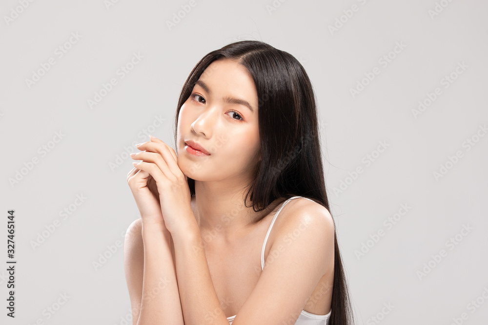 Beautiful Young Asian Woman Holding Hands smile feeling so happy and cheerful with healthy Clean and Fresh skin,isolated on white background,Beauty Cosmetics Concept Beautiful Young Asian Woman Holding Hands smile feeling so happy and cheerful with healthy Clean and Fresh skin,isolated on white background,Beauty Cosmetics Concept