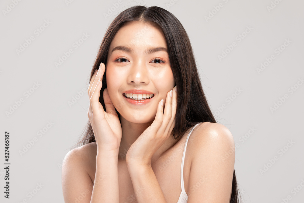 Beautiful Asian woman touching soft cheek smile with clean and fresh skin Happiness and cheerful with positive emotional,isolated on white background,Beauty and Cosmetics Concept Beautiful Asian woman touching soft cheek smile with clean and fresh skin Happiness and cheerful with positive emotional,isolated on white background,Beauty and Cosmetics Concept