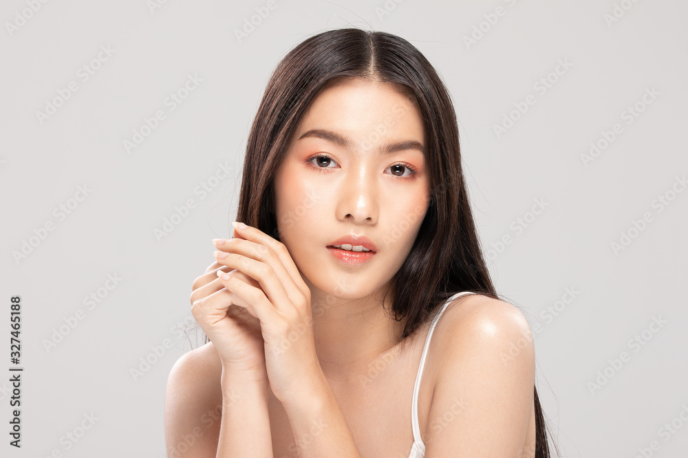 Beautiful Young Asian Woman Holding Hands smile feeling so happy and cheerful with healthy Clean and Fresh skin,isolated on white background,Beauty Cosmetics Concept