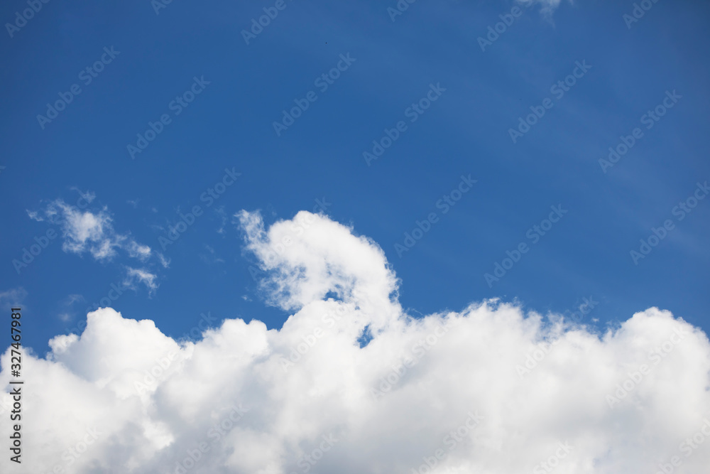Blue sky background and white clouds soft focus, and copy space Blue sky background and white clouds soft focus, and copy space