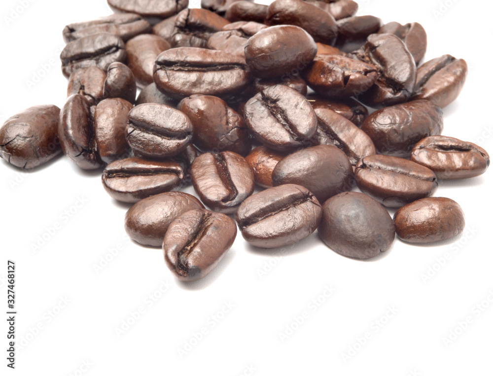a pile of coffee beans medium roast solated on white background with copy space a pile of coffee beans medium roast solated on white background with copy space