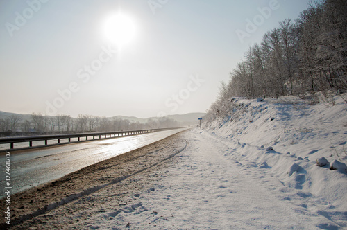 art photo of the road to the sun after a snowfall