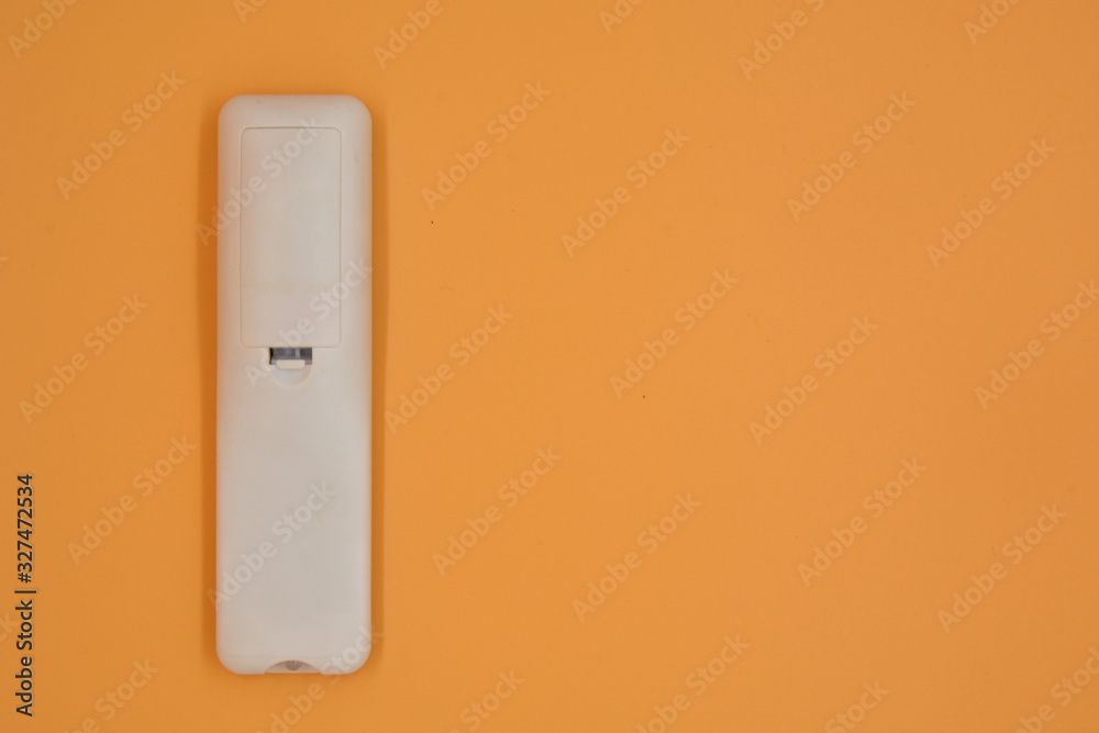 The remote control is isolated on a white background The remote control is isolated on a white background
