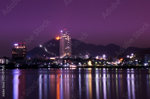 Colorful night view of Sriracha  Thailand  with modern city buildings