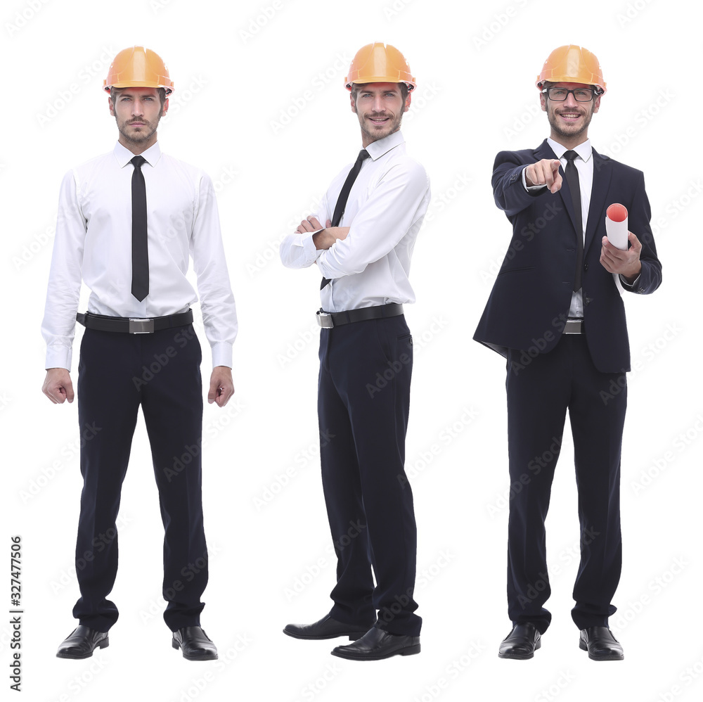 in full growth .successful architect engineer in orange helmet. in full growth .successful architect engineer in orange helmet.