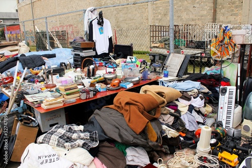 Fototapeta Naklejka Na Ścianę i Meble -  Second hand items for sale at street market in Athens, Greece