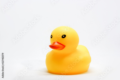 photo of a yellow rubber duck. usually used as a distraction of children's attention when in the bathroom