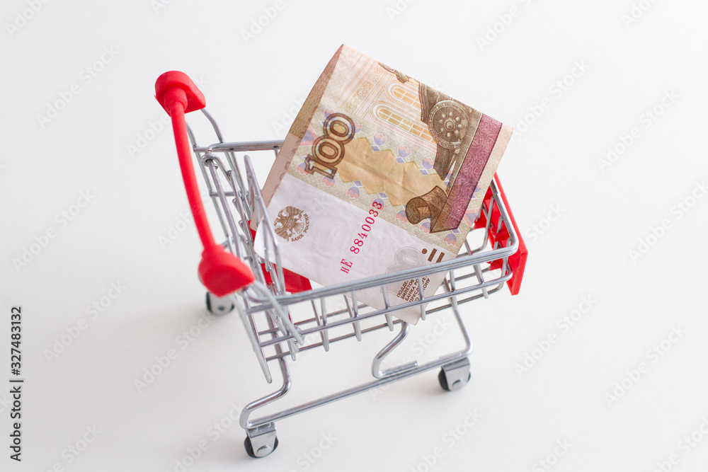 paper One hundred rubles Russian rubles in a mini shopping cart