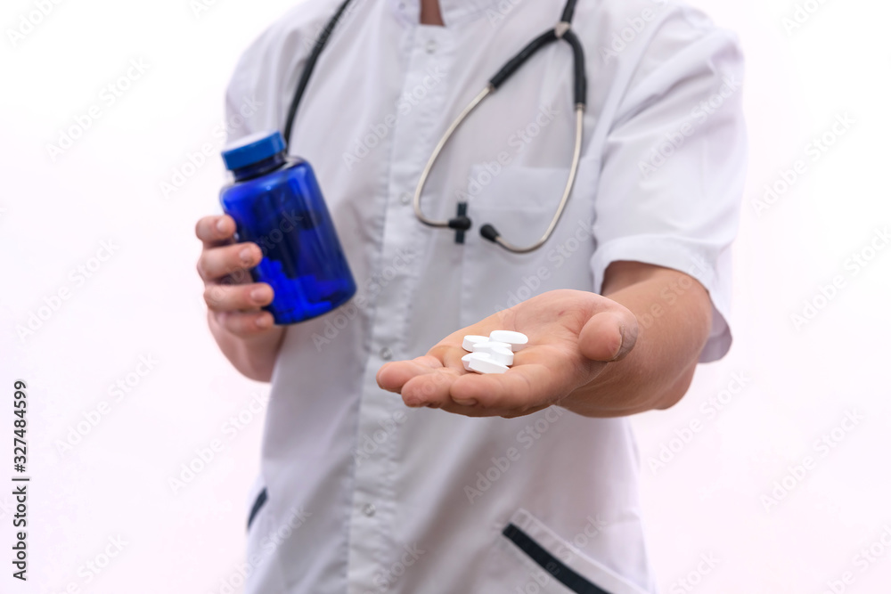 Doctor offering white pills. Medication and pharmacy concept Doctor offering white pills. Medication and pharmacy concept