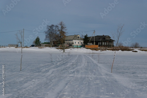 a village on an island in the Northern Dvina Delta in the winter. © Natali Arkhangelsk
