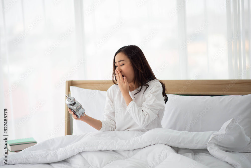 Asain teenager woman just wake up in the morning in the bedroom Asain teenager woman just wake up in the morning in the bedroom