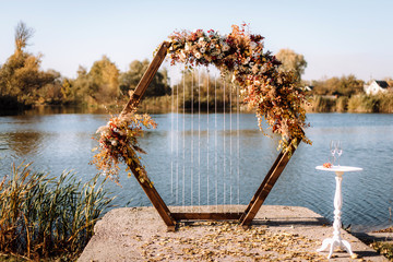 wedding arch near the pond