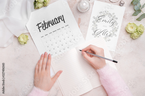 Woman planning her wedding ...