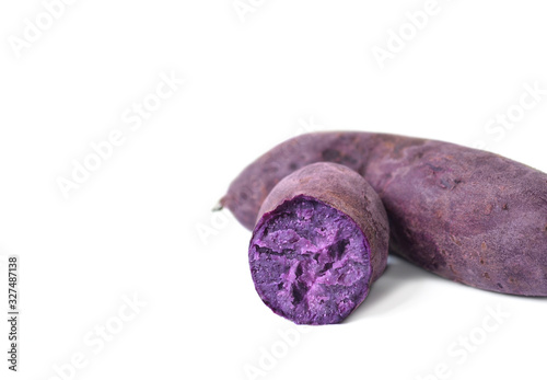 Purple sweet potato on white isolated background  healthy food concept