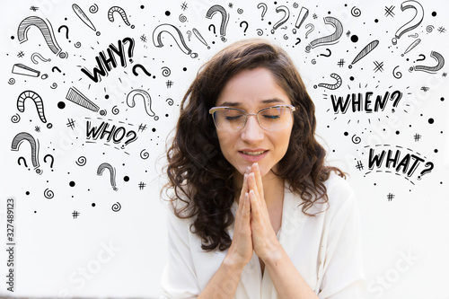 Canvas Print Beautiful woman in eyeglasses praying with closed eyes