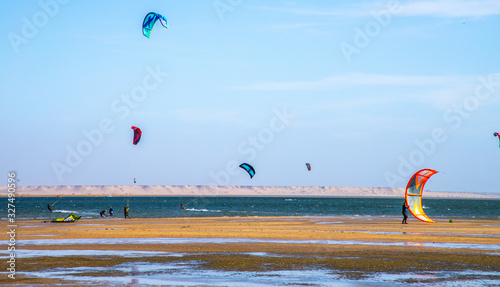 surfers on the Dakhla sea, Western Sahara, Morocco photo