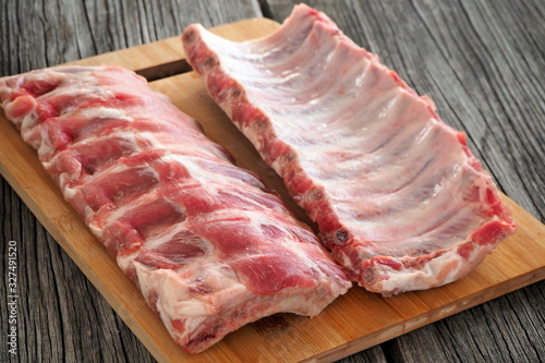 Pork ribs on a cutting board photo