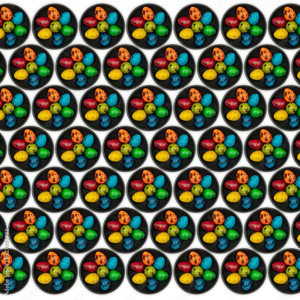 Colorful easter eggs on black plate isolated on white background. Colorful easter eggs on black plate isolated on white background.