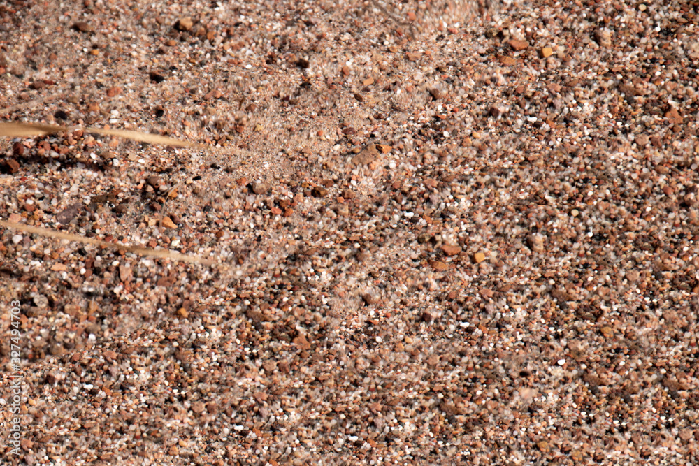 Background of wet sand, heart made of sand, beach sand. Background of wet sand, heart made of sand, beach sand.
