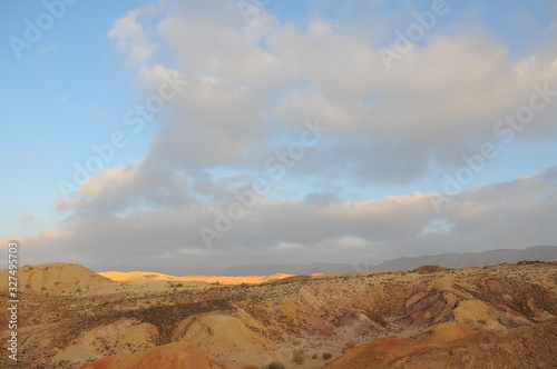 Desert landscape at sunrise. Hiking desert part of Israel National Trail. Negev desert . Valley. Colorful sands 