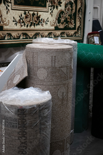 Big roll of carpet in a hom...