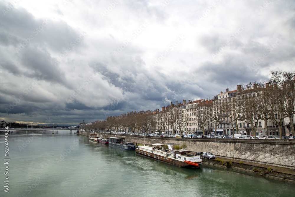 Stormy sky over the Banks of the river Rhone in Lyon, France.