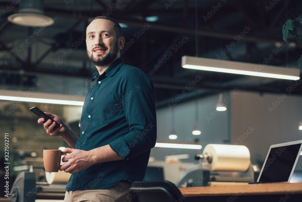 Calm day in the office for young man stock photo Calm day in the office for young man stock photo