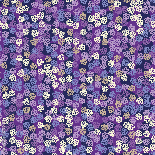 Purple floral seamless vector pattern. Decorative girly surface print design. Great for fabrics, stationery and packaging.