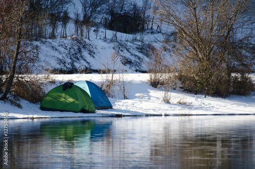 Camping tent on the lake shore in Turkey mountains.
