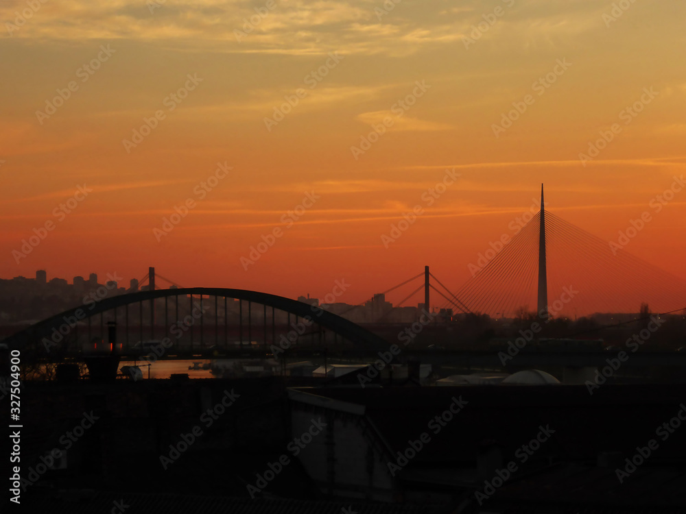 Obraz premium Bridges on the Sava river at sunset in Belgrade, Serbia